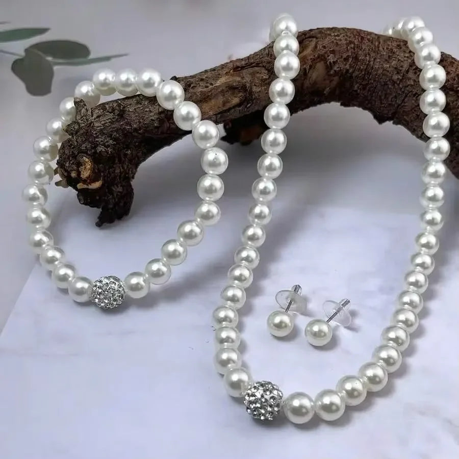 Conjunto Aurora: Colar, Pulseira e Brincos de Pérolas
