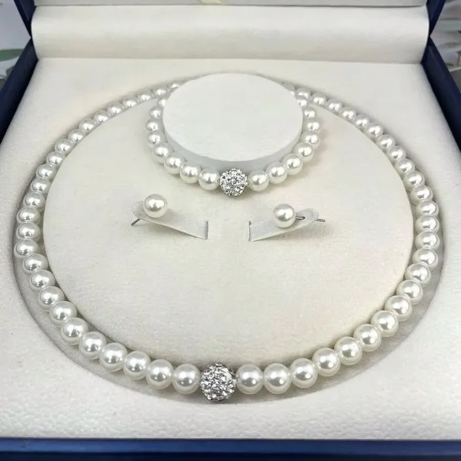 Conjunto Aurora: Colar, Pulseira e Brincos de Pérolas